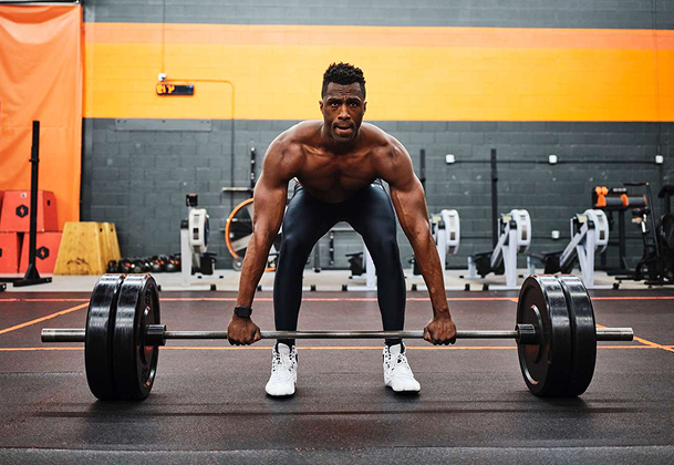 Athlete using pre workout supplement before training in Belgium