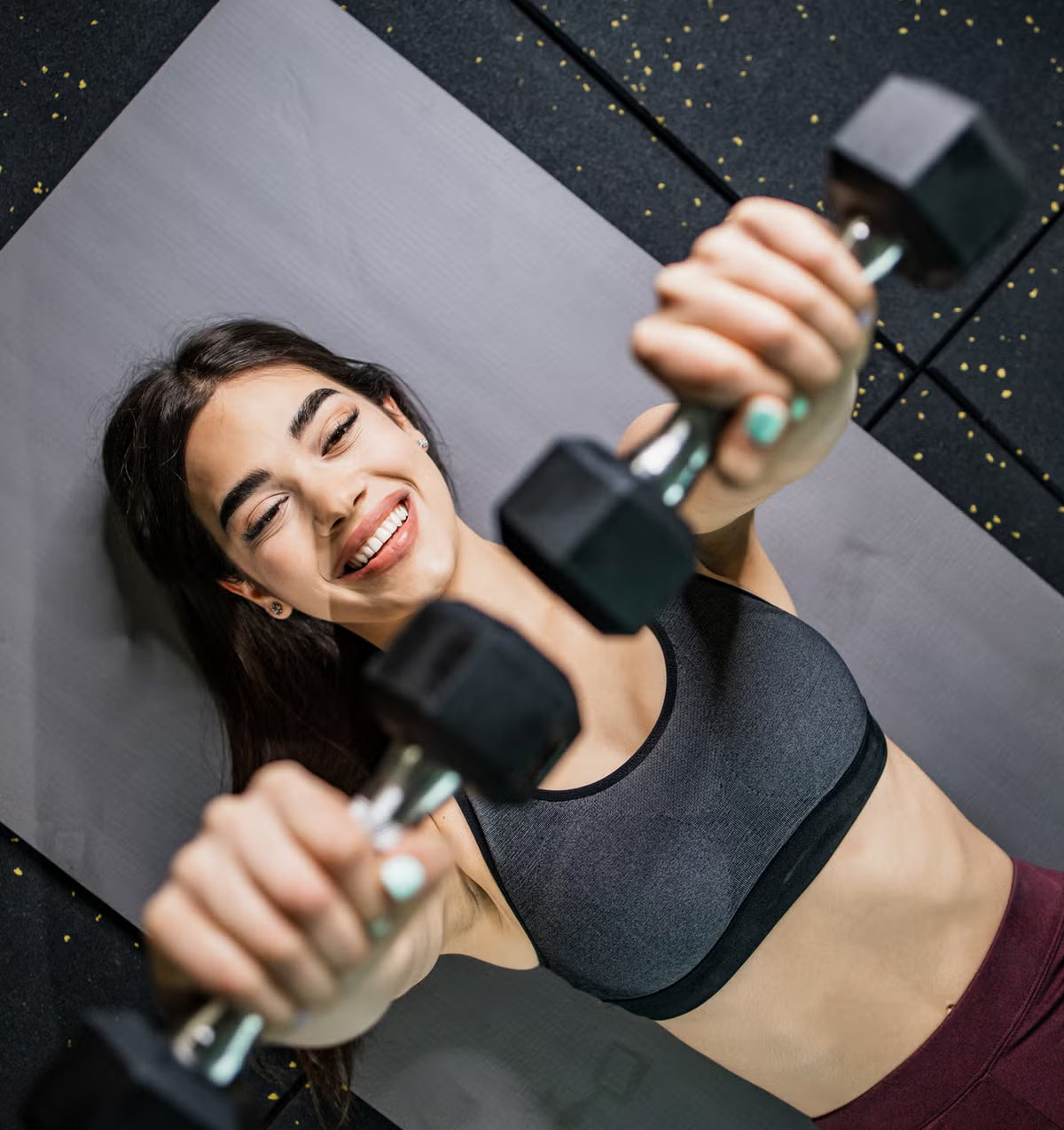 Athlete training in the gym to build strength, improve fitness, and support workout performance with Performance.